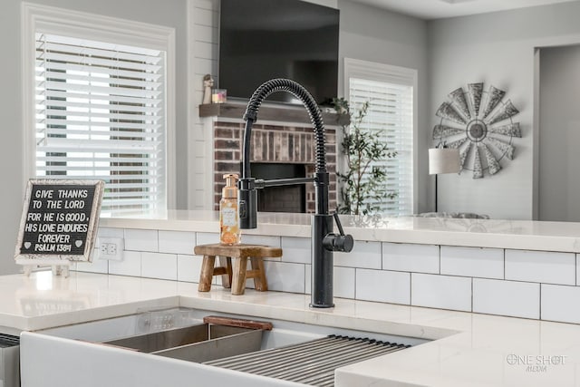 3085 County Road 131, Tuscola, TX 79562 - kitchen view of tasteful backsplash and a sink