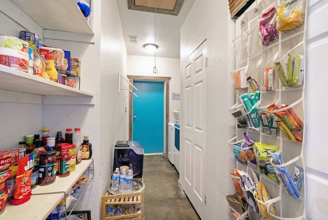 interior space with washer / clothes dryer