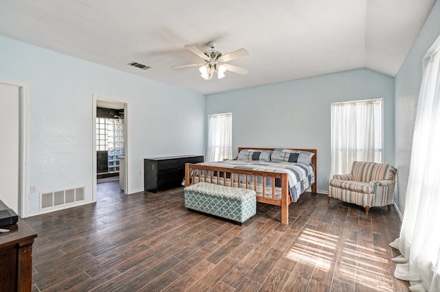 bedroom featuring ceiling fan, hardwood / wood-style flooring, and lofted ceiling