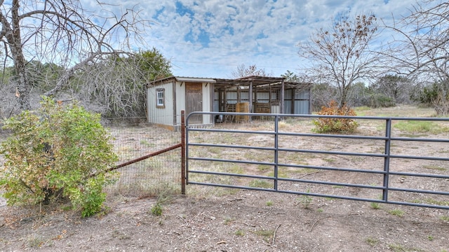 exterior space featuring an outbuilding