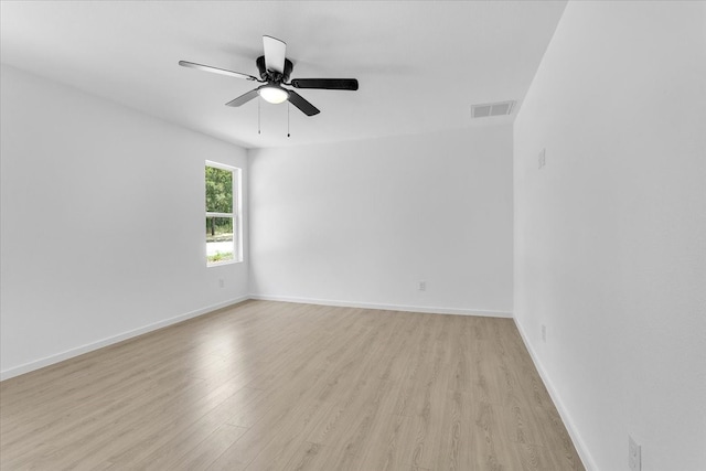 unfurnished room featuring ceiling fan and light hardwood / wood-style flooring