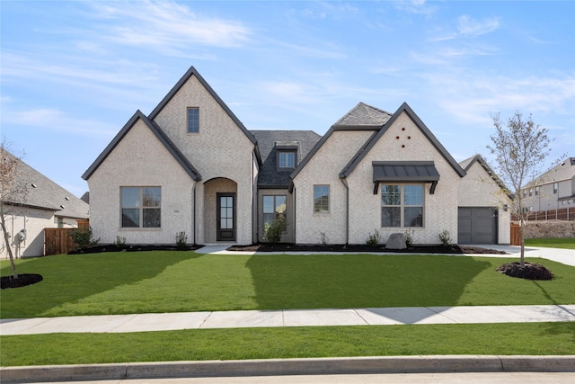 2001 Rockwood Ln, Mansfield, TX 76063 - french country style house with fence, a shingled roof, a front lawn, and a garage