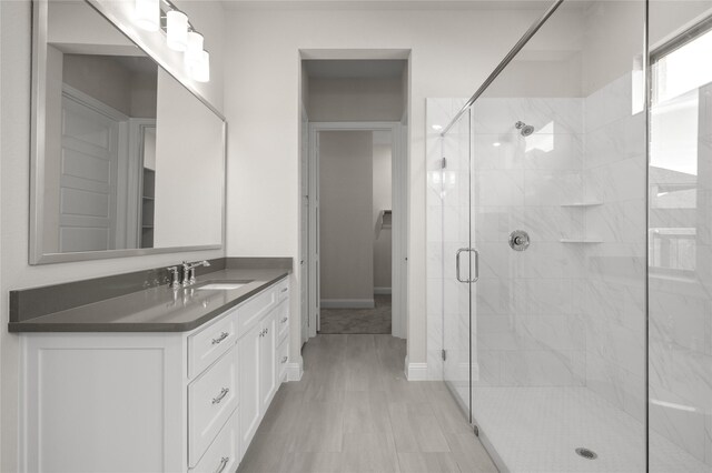 2001 Rockwood Ln, Mansfield, TX 76063 - bathroom featuring baseboards, a shower stall, and vanity