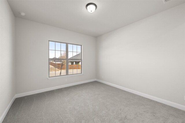2001 Rockwood Ln, Mansfield, TX 76063 - carpeted empty room with baseboards and visible vents
