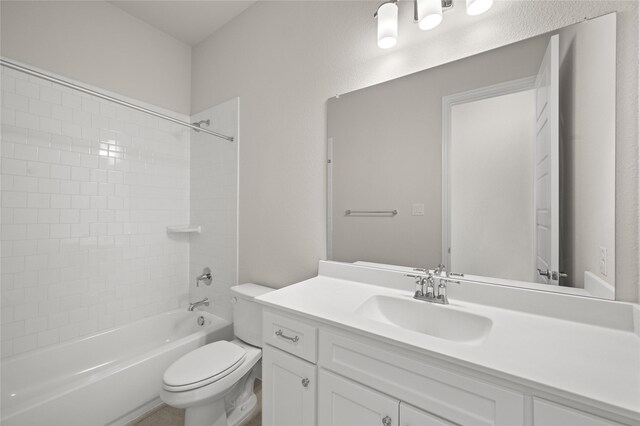 2001 Rockwood Ln, Mansfield, TX 76063 - full bathroom featuring tub / shower combination, vanity, and toilet