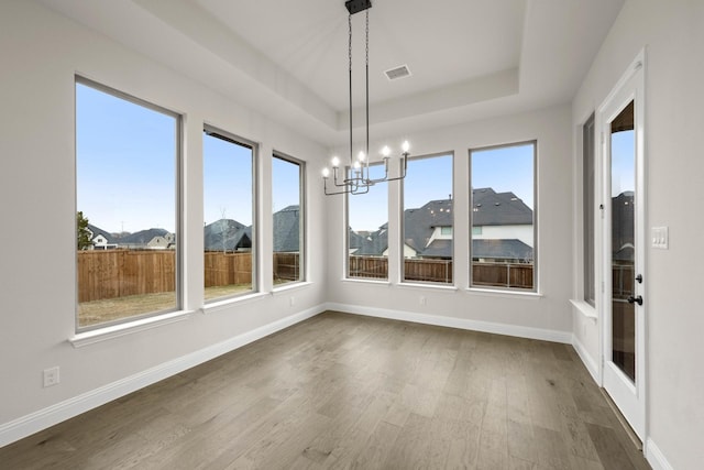 kitchen featuring tasteful backsplash, dark wood-style floors, appliances with stainless steel finishes, light countertops, and white cabinetry