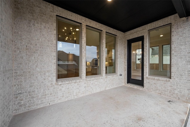 carpeted spare room featuring baseboards