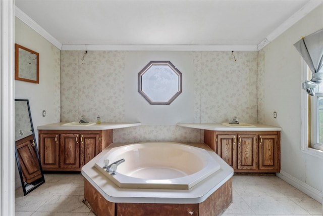 bathroom with a bathing tub, crown molding, vanity, and tile patterned floors