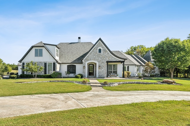 view of front of house with a front lawn