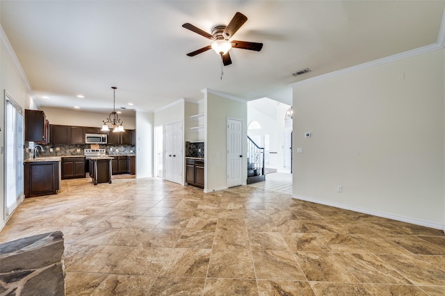 5012 Bryn Mawr Dr, Mckinney, TX 75072 - unfurnished living room featuring crown molding, a sink, a chandelier, a ceiling fan, and baseboards
