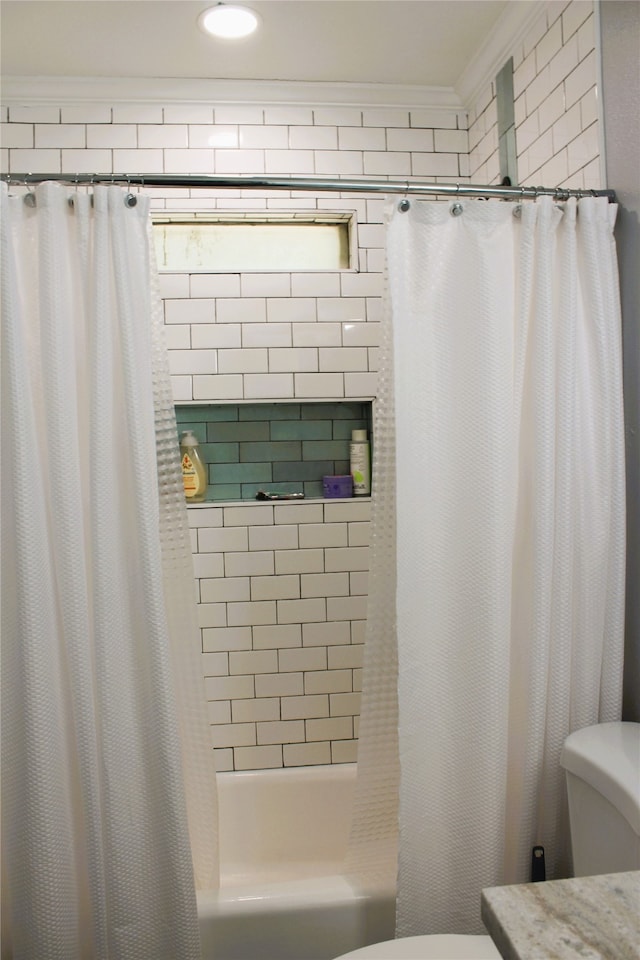 full bathroom with ornamental molding, shower / bath combination with curtain, vanity, and toilet