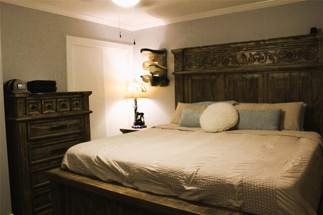 bedroom featuring crown molding