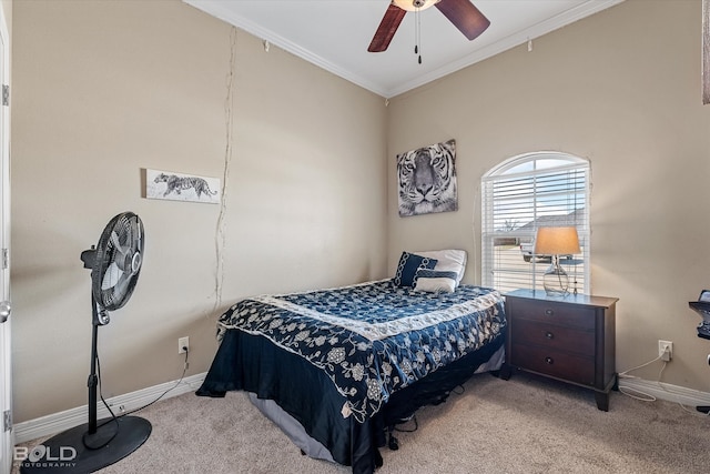 bedroom with ceiling fan, ornamental molding, and light carpet