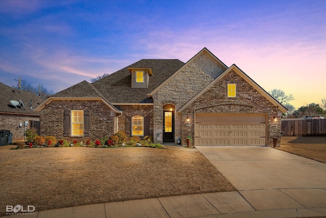 view of front of home with a garage