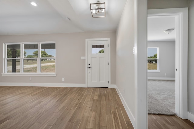 foyer entrance featuring hardwood / wood-style floors