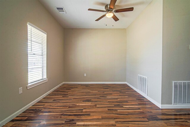 empty room featuring hardwood / wood-style floors and ceiling fan