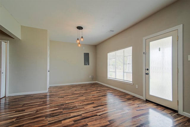 interior space with hardwood / wood-style flooring and electric panel