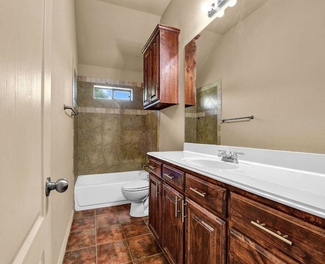 bathroom featuring toilet, tile patterned flooring, shower / tub combination, and vanity