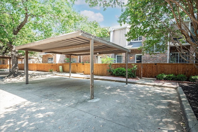 view of patio / terrace featuring a carport