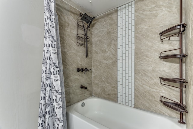 bathroom featuring shower / bath combo with shower curtain