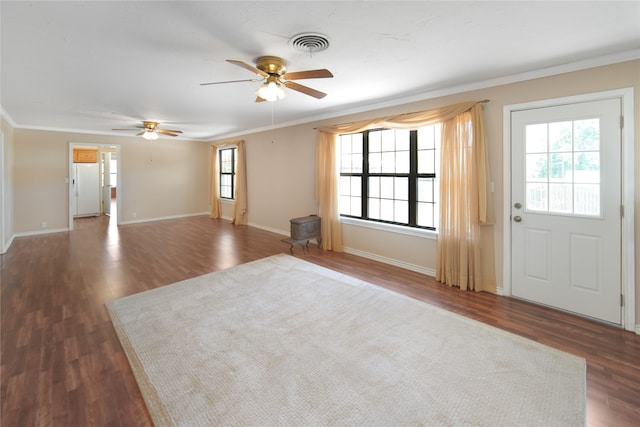 unfurnished living room featuring ceiling fan, hardwood / wood-style flooring, and crown molding