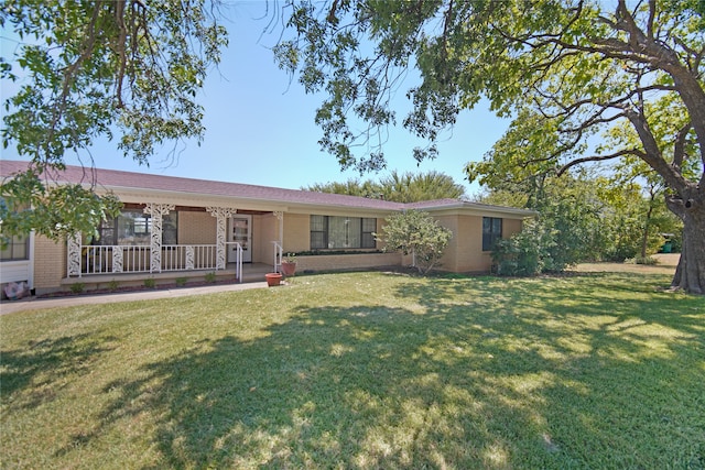 view of front of home featuring a front lawn and a porch