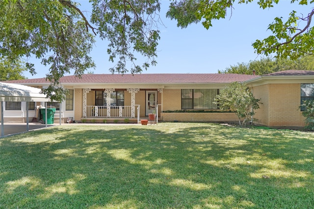 ranch-style house with a front yard and a porch