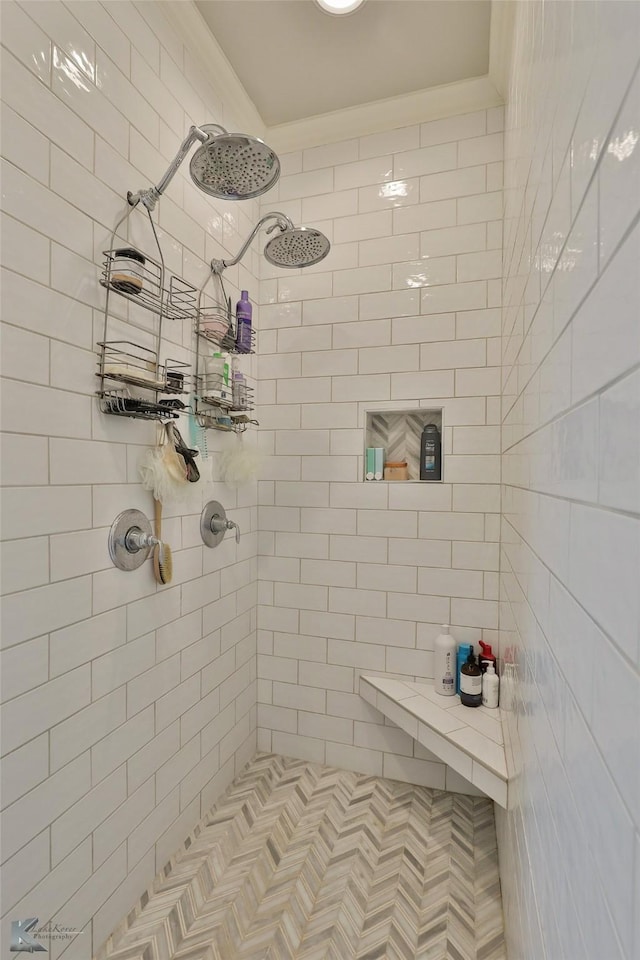 bathroom featuring a tile shower