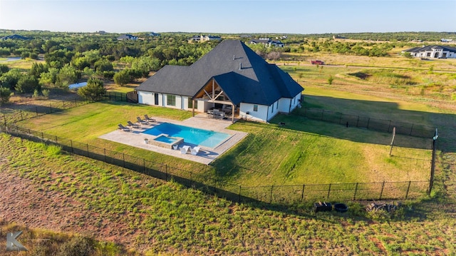 birds eye view of property featuring a rural view