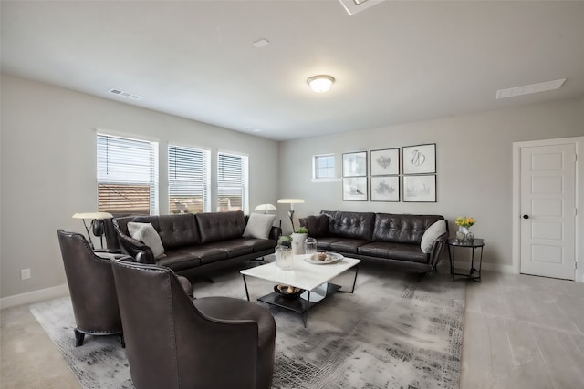 living room featuring light colored carpet