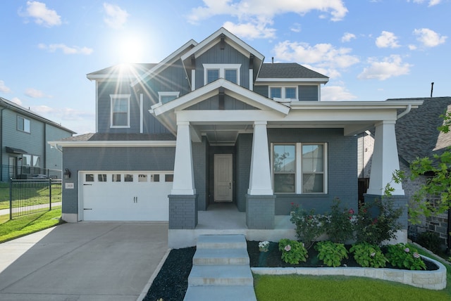 craftsman house with a garage