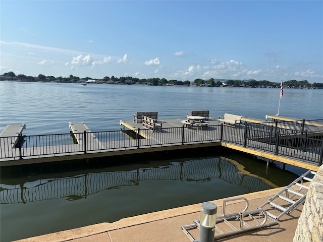 view of dock with a water view