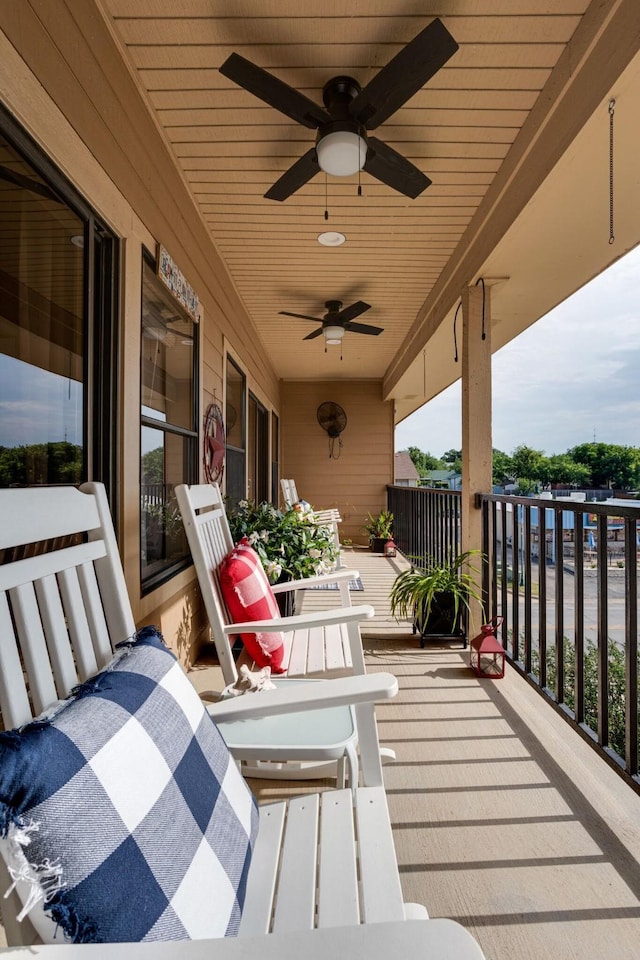 exterior space with ceiling fan