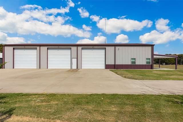 garage with a yard