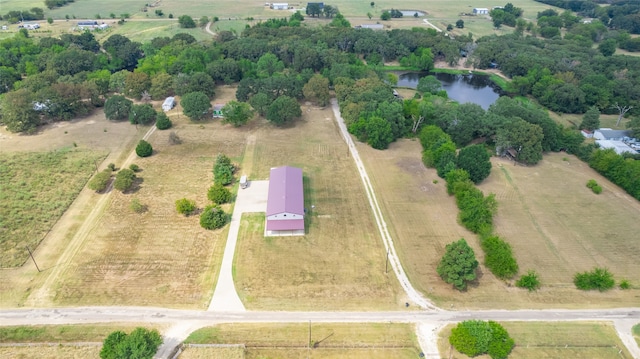 drone / aerial view with a rural view and a water view