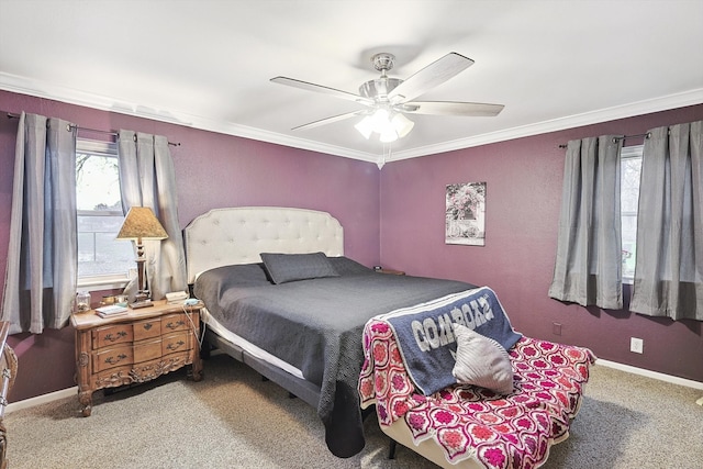 bedroom featuring carpet floors, crown molding, and ceiling fan