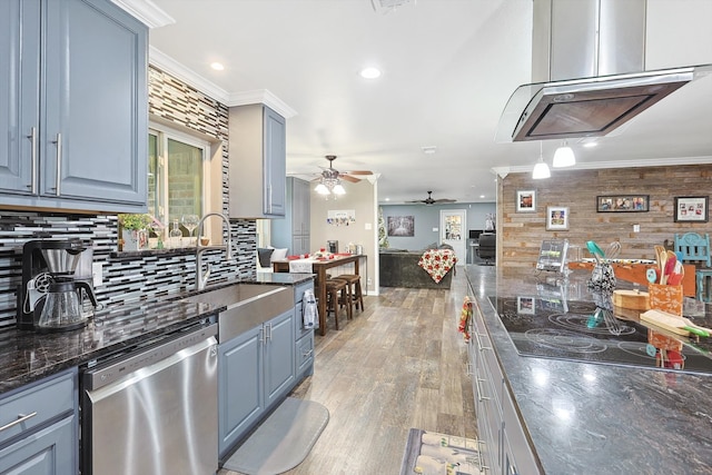 kitchen with ceiling fan, light wood-type flooring, decorative backsplash, stainless steel dishwasher, and sink