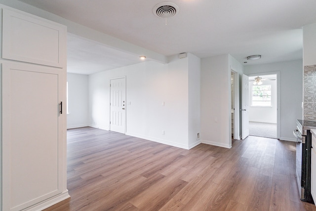 spare room with ceiling fan and light hardwood / wood-style flooring