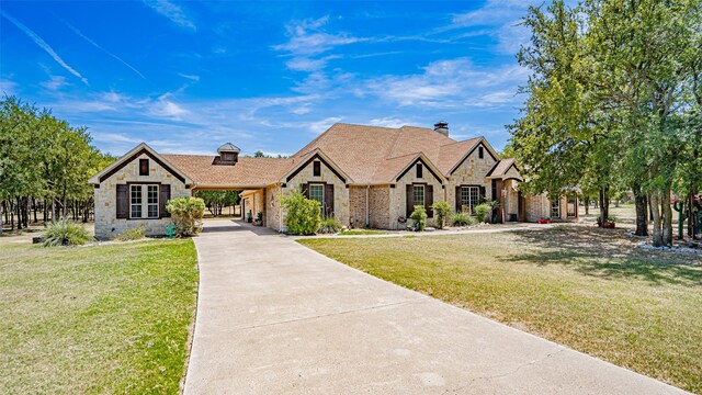 view of front of home with a front lawn