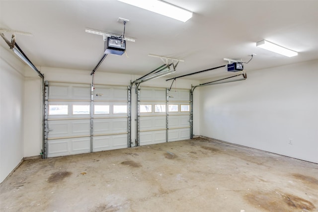 garage featuring a garage door opener