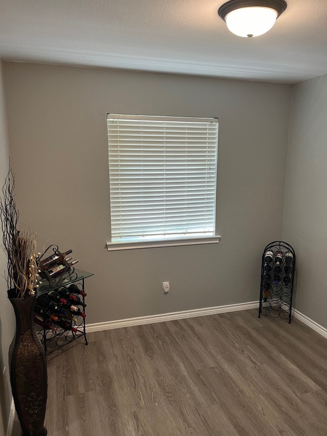 unfurnished room featuring hardwood / wood-style floors