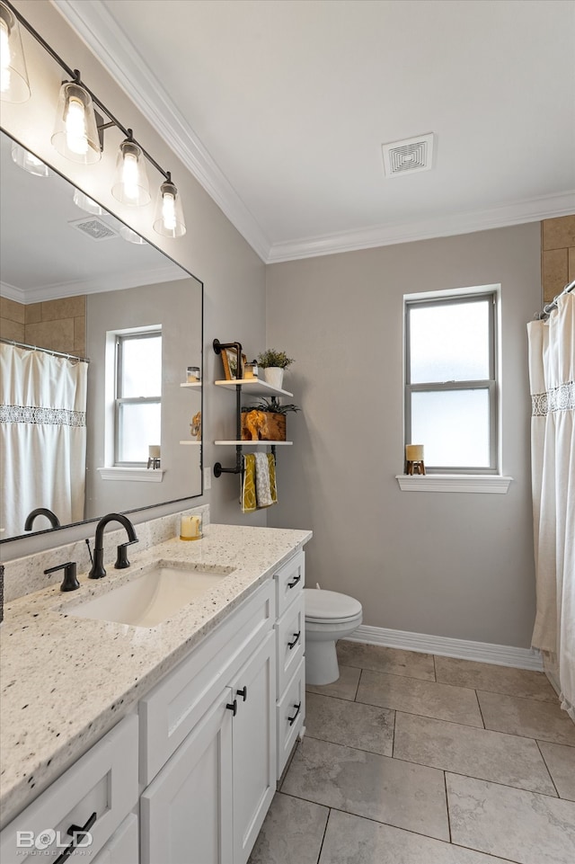 bathroom with crown molding, vanity, toilet, and curtained shower