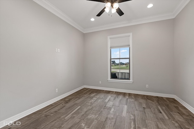 spare room featuring ceiling fan, dark hardwood / wood-style flooring, and crown molding