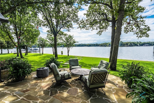 view of patio / terrace featuring a water view