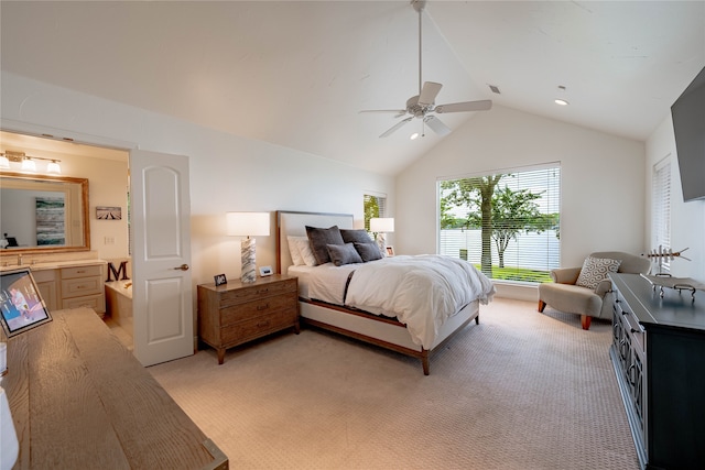 carpeted bedroom featuring ceiling fan and vaulted ceiling