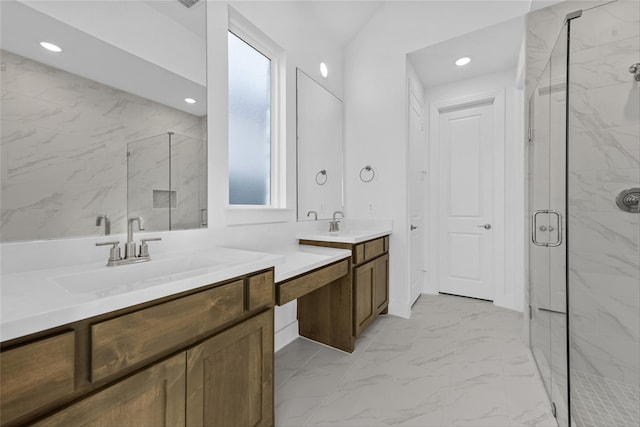 bathroom with an enclosed shower and vanity