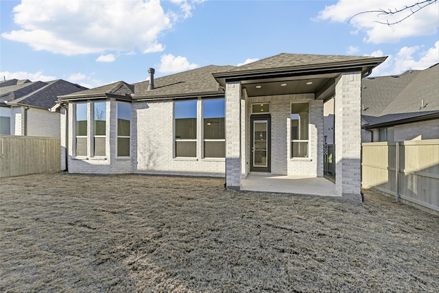 rear view of property with a patio area