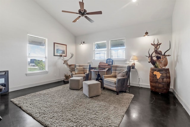 living room featuring ceiling fan and high vaulted ceiling