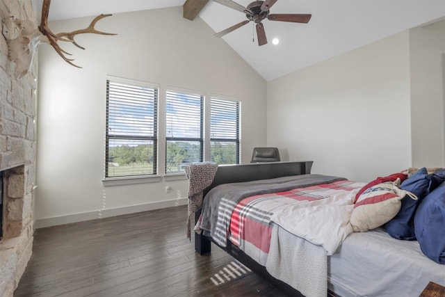 bedroom with high vaulted ceiling, a fireplace, beamed ceiling, wood-type flooring, and ceiling fan