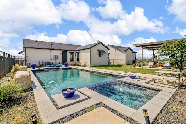 view of swimming pool with an in ground hot tub and a patio